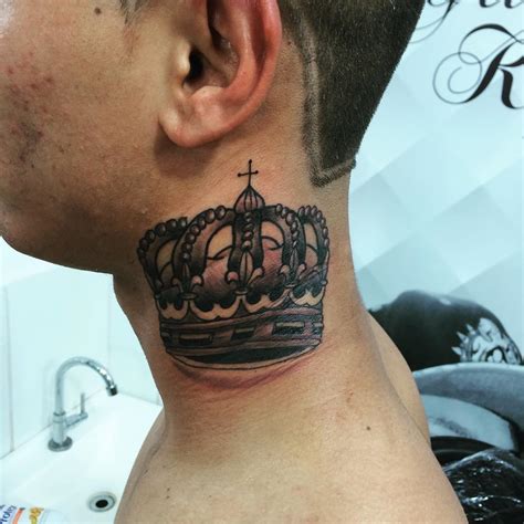 crown neck tattoo.